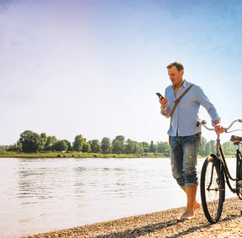 guy on phone with bike