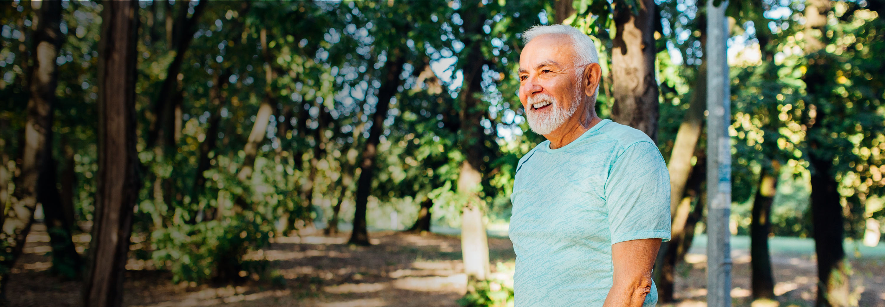 elderly man in woods