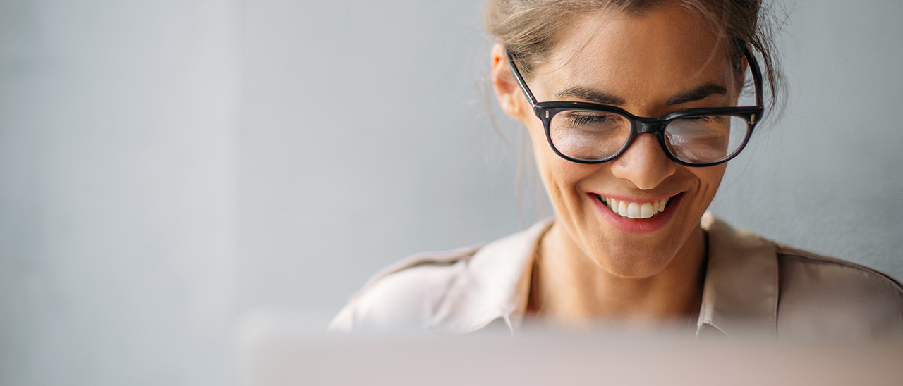 smiling woman with glasses