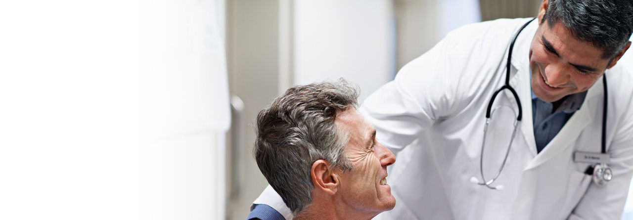 man talking to doctor